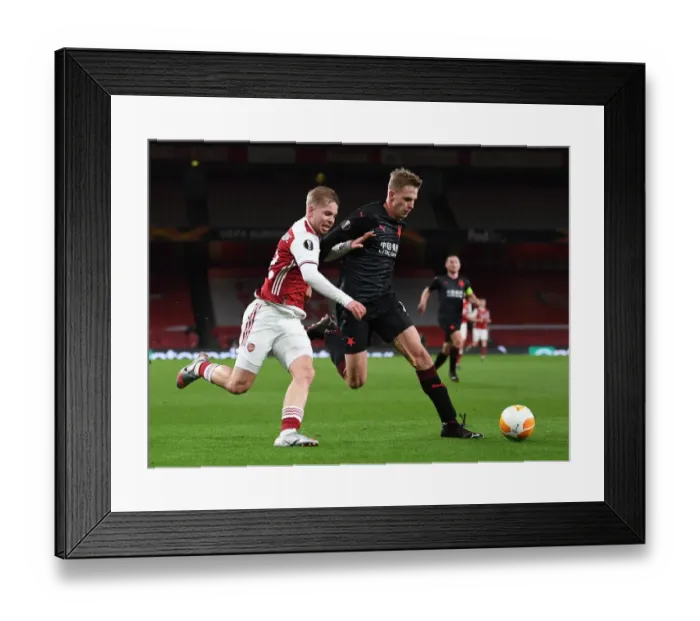 Framed Print : Arsenal vs Slavia Prague: Emile Smith Rowe Clash in Empty Europa League Quarterfinal Framed Print : Arsenal vs Slavia Prague: Emile Smith Rowe Clash in Empty Europa League Quarterfinal