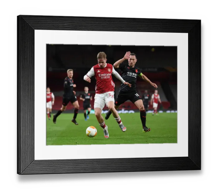 Framed Print : Arsenal vs Slavia Praha: Emile Smith Rowe Clashes with Jan Boril in Empty Europa League Quarterfinal Framed Print : Arsenal vs Slavia Praha: Emile Smith Rowe Clashes with Jan Boril in Empty Europa League Quarterfinal