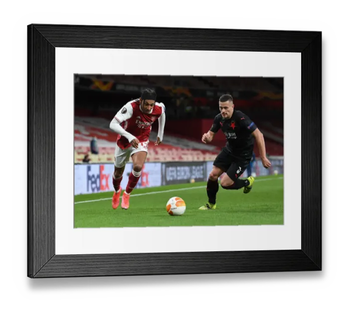 Framed Print : Arsenal's Aubameyang Clashes with Slavia's Holes in Empty Europa League Quarterfinal Framed Print : Arsenal's Aubameyang Clashes with Slavia's Holes in Empty Europa League Quarterfinal