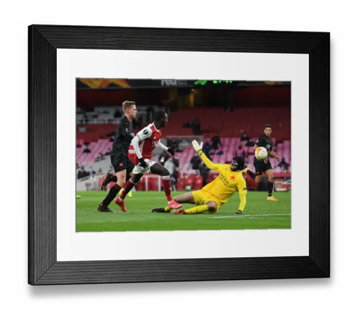 Framed Print : Arsenal's Nicolas Pepe Scores in Empty Emirates Stadium Against Slavia Praha in UEFA Europa League Quarterfinals