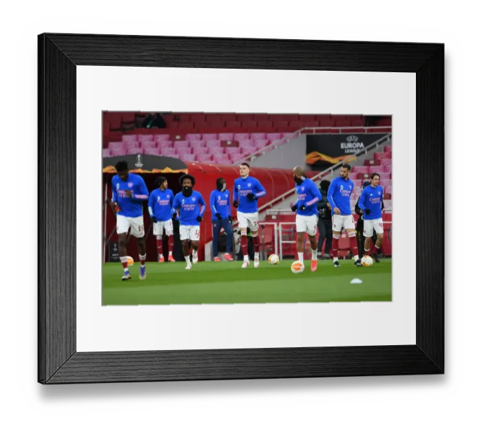 Framed Print : Arsenal's Granit Xhaka: Pre-Match Focus at Empty Emirates Stadium in Europa League Quarterfinal vs Slavia Praha (2021) Framed Print : Arsenal's Granit Xhaka: Pre-Match Focus at Empty Emirates Stadium in Europa League Quarterfinal vs Slavia Praha (2021)