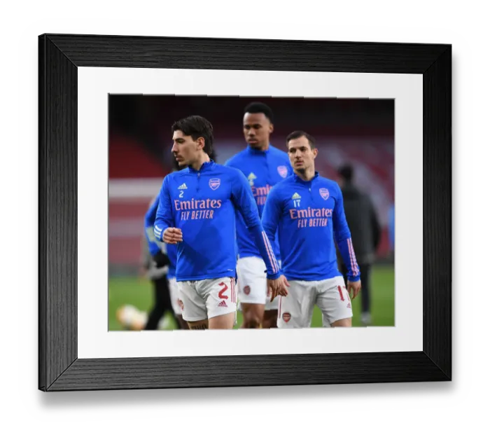 Framed Print : Arsenal's Hector Bellerin Gears Up for Europa League Quarterfinal at Empty Emirates Stadium Framed Print : Arsenal's Hector Bellerin Gears Up for Europa League Quarterfinal at Empty Emirates Stadium