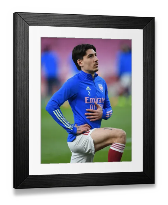 Framed Print : Arsenal FC vs Slavia Praha: Hector Bellerin Warms Up Ahead of UEFA Europa League Quarterfinal at Empty Emirates Stadium