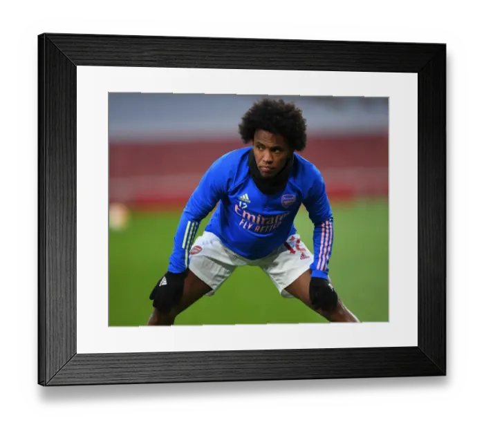 Framed Print : Arsenal FC vs Slavia Praha: UEFA Europa League Quarterfinal - Willian Warming Up at Empty Emirates Stadium Framed Print : Arsenal FC vs Slavia Praha: UEFA Europa League Quarterfinal - Willian Warming Up at Empty Emirates Stadium