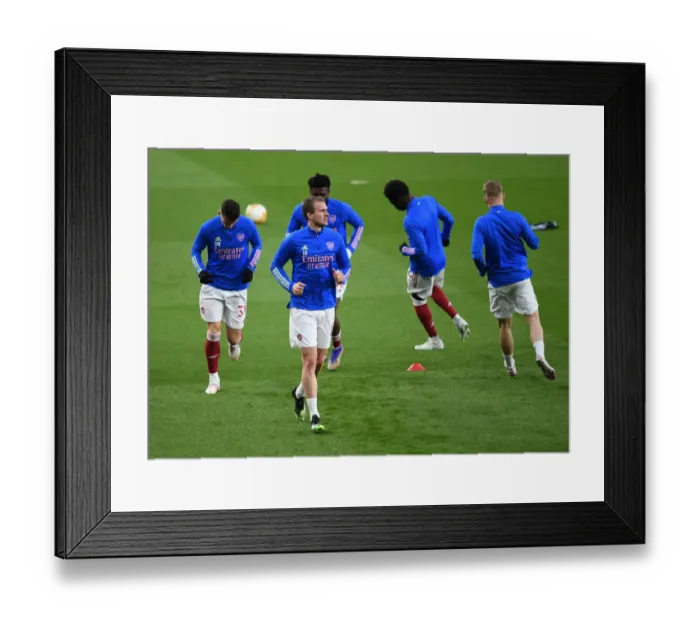 Framed Print : Arsenal's Rob Holding Gears Up for Empty Emirates Europa League Quarterfinal vs Slavia Praha