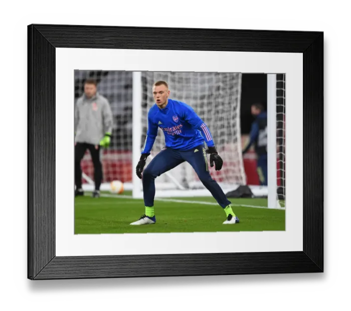 Framed Print : Arsenal FC vs Slavia Praha: Europa League Quarterfinal - Karl Hein Warms Up at Empty Emirates Stadium