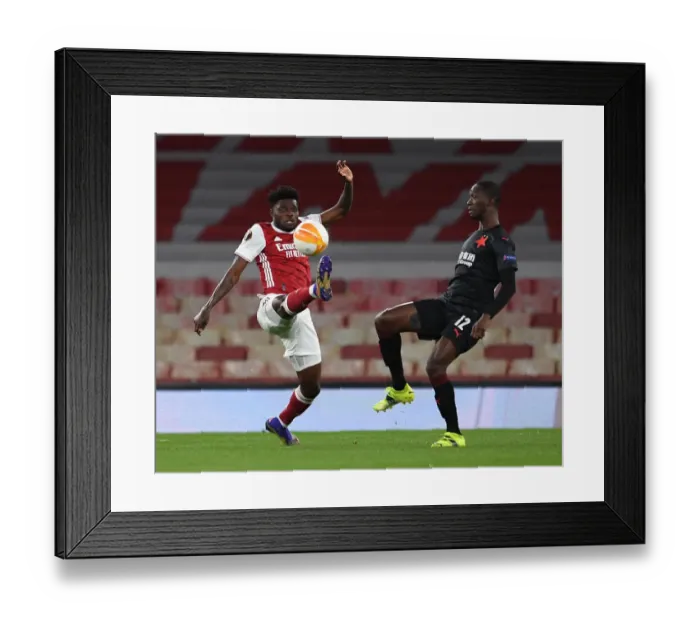 Framed Print : Arsenal vs Slavia Prague: Thomas Partey Faces Off in Empty Europa League Quarterfinal Framed Print : Arsenal vs Slavia Prague: Thomas Partey Faces Off in Empty Europa League Quarterfinal