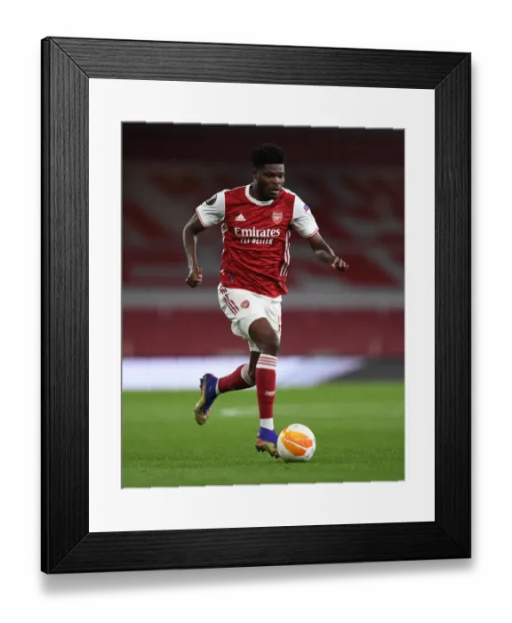 Framed Print : Arsenal's Thomas Partey in UEFA Europa League Quarterfinal vs Slavia Praha at Empty Emirates Stadium
