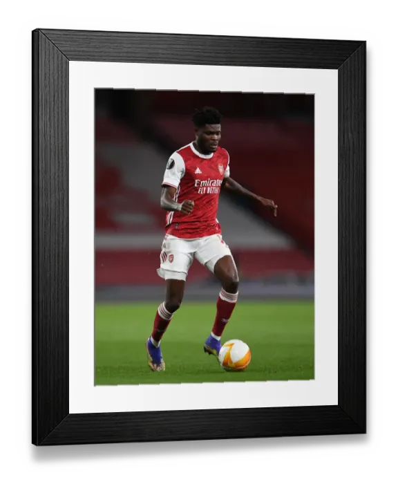 Framed Print : Arsenal's Thomas Partey in Europa League Quarterfinal Against Slavia Praha at Empty Emirates Stadium