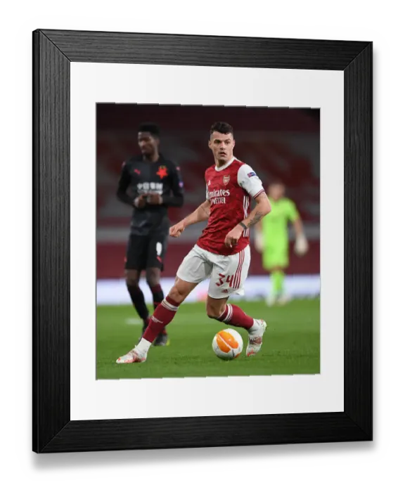 Framed Print : Lone Warrior Xhaka: Arsenal's Battle in Empty Emirates Stadium - UEFA Europa League Quarterfinal vs Slavia Praha Framed Print : Lone Warrior Xhaka: Arsenal's Battle in Empty Emirates Stadium - UEFA Europa League Quarterfinal vs Slavia Praha