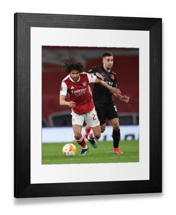 Framed Print : Elneny vs Lingr: A Battle of Midfielders in Empty Emirates Stadium - Arsenal vs Slavia Prague, Europa League Quarterfinal Framed Print : Elneny vs Lingr: A Battle of Midfielders in Empty Emirates Stadium - Arsenal vs Slavia Prague, Europa League Quarterfinal