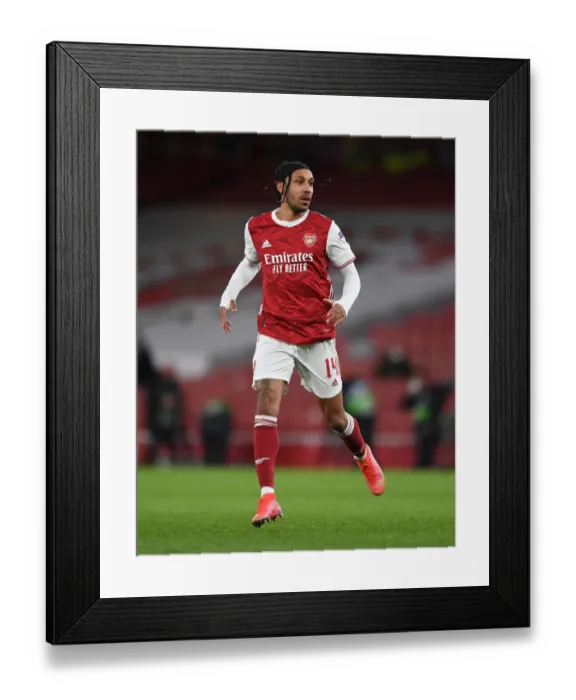 Framed Print : Arsenal's Aubameyang in Empty Emirates: Arsenal vs Slavia Praha, Europa League Quarterfinal Amidst COVID-19 Restrictions