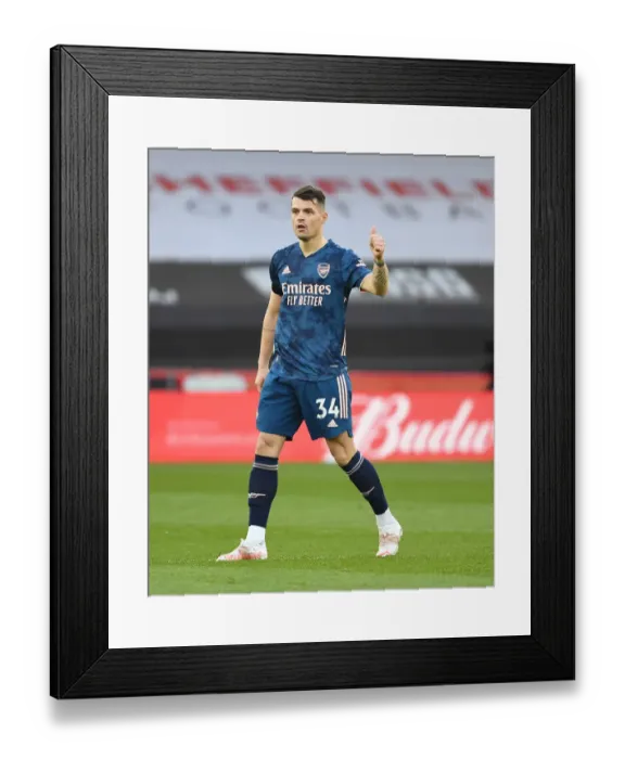 Framed Print : Granit Xhaka in Action: Sheffield United vs Arsenal, Premier League 2021 (Behind Closed Doors)