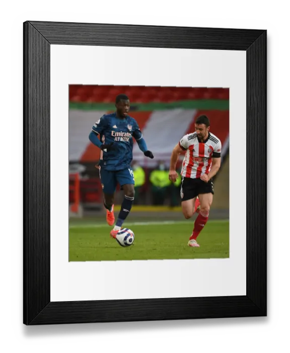 Framed Print : Pepe Breaks Past Stevens: Sheffield United vs. Arsenal, 2021 Premier League Framed Print : Pepe Breaks Past Stevens: Sheffield United vs. Arsenal, 2021 Premier League