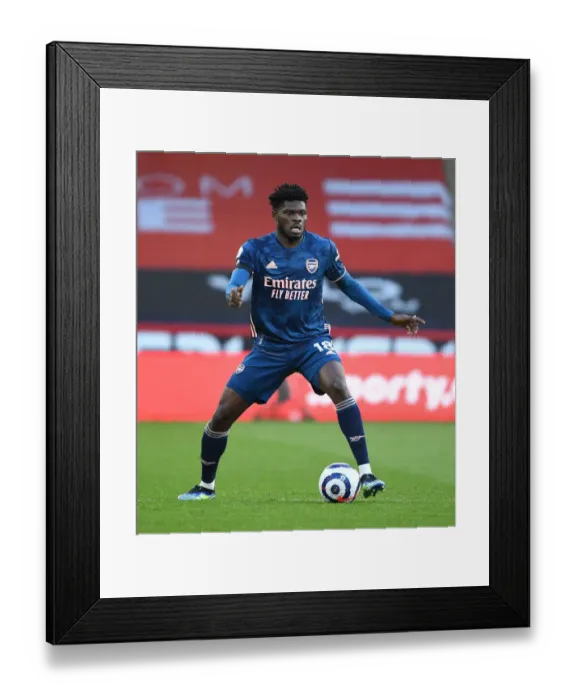Framed Print : Thomas Partey in Action: 2021 Premier League - Arsenal vs Sheffield United (Behind Closed Doors) Framed Print : Thomas Partey in Action: 2021 Premier League - Arsenal vs Sheffield United (Behind Closed Doors)