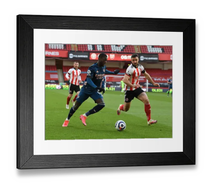 Framed Print : Pepe vs Stevens: Sheffield United vs Arsenal, Premier League 2021 (Behind Closed Doors)