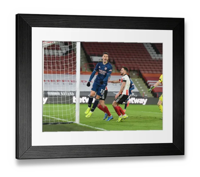 Framed Print : Martinelli Scores Second as Arsenal Overpower Sheffield United in Empty Bramall Lane