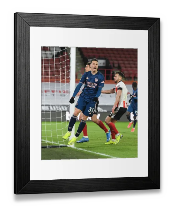 Framed Print : Martinelli Scores as Arsenal Dominate Sheffield United in Empty Bramall Lane