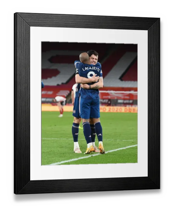 Framed Print : Arsenal's Euphoric Double Act: Lacazette and Xhaka's Goal Celebration vs Sheffield United (2020-21) Framed Print : Arsenal's Euphoric Double Act: Lacazette and Xhaka's Goal Celebration vs Sheffield United (2020-21)