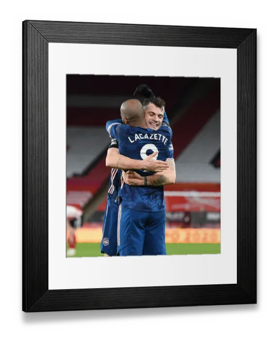 Framed Print : Alex Lacazette and Granit Xhaka Celebrate Arsenal's Third Goal Against Sheffield United (April 2021)