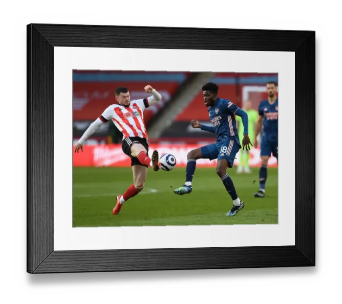 Framed Print : Thomas Partey Faces Off Against Oliver Burke: Sheffield United vs. Arsenal, Premier League 2020-21 Framed Print : Thomas Partey Faces Off Against Oliver Burke: Sheffield United vs. Arsenal, Premier League 2020-21
