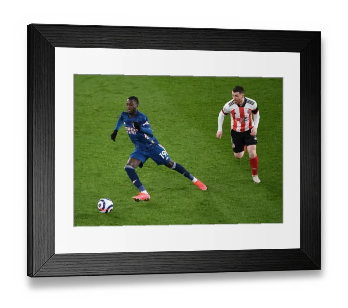 Framed Print : Pepe vs Fleck: Battle at Bramall Lane - Sheffield United vs Arsenal, Premier League 2020-21