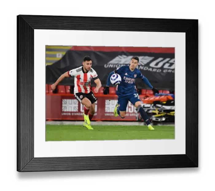 Framed Print : Martinelli vs Baldock: Clash at Bramall Lane - Sheffield United vs Arsenal, Premier League 2020-21