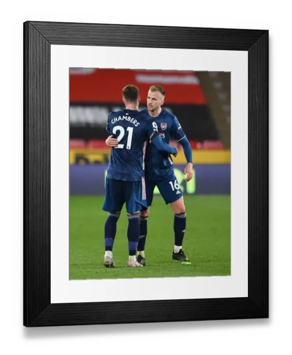 Framed Print : Arsenal's Calum Chambers and Rob Holding Celebrate Victory Over Sheffield United (Sheffield United v Arsenal, 2021)