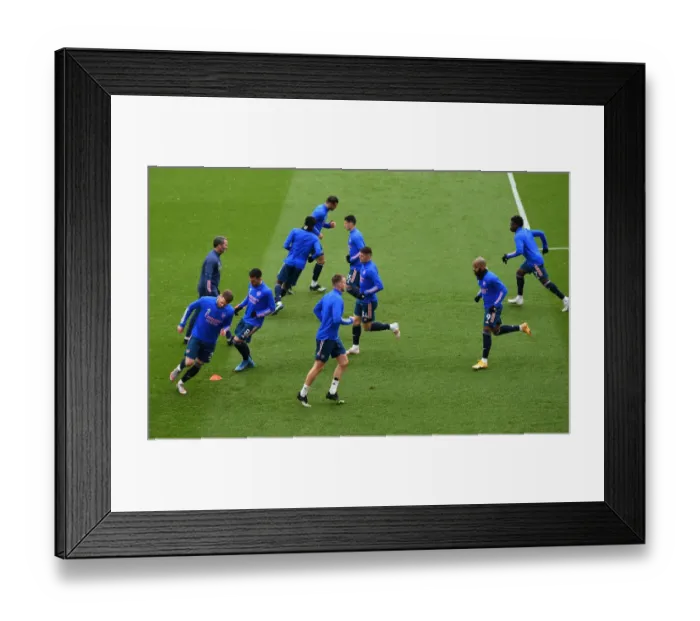 Framed Print : Arsenal Players Warm Up Ahead of Sheffield United Showdown in Premier League Framed Print : Arsenal Players Warm Up Ahead of Sheffield United Showdown in Premier League