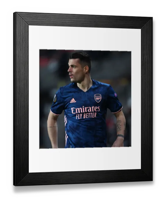 Framed Print : Arsenal's Granit Xhaka in Empty Eden Arena: UEFA Europa League Quarterfinal vs. Slavia Praha, Prague Framed Print : Arsenal's Granit Xhaka in Empty Eden Arena: UEFA Europa League Quarterfinal vs. Slavia Praha, Prague