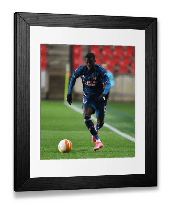 Framed Print : Arsenal's Nicolas Pepe in UEFA Europa League Quarterfinal Match against Slavia Praha in Prague (2020-21) Framed Print : Arsenal's Nicolas Pepe in UEFA Europa League Quarterfinal Match against Slavia Praha in Prague (2020-21)