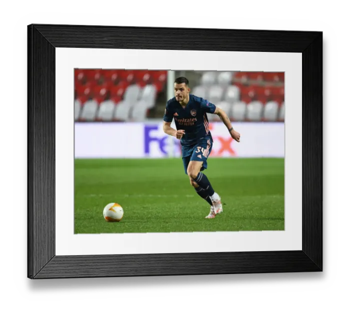 Framed Print : Lone Warrior: Granit Xhaka in Empty Eden Arena during Arsenal's UEFA Europa League Quarterfinal Framed Print : Lone Warrior: Granit Xhaka in Empty Eden Arena during Arsenal's UEFA Europa League Quarterfinal