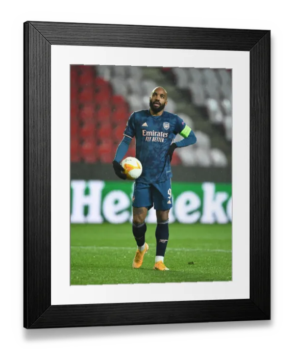 Framed Print : Lone Warrior: Alex Lacazette Faces Slavia Praha in Empty Europa League Quarterfinal Framed Print : Lone Warrior: Alex Lacazette Faces Slavia Praha in Empty Europa League Quarterfinal