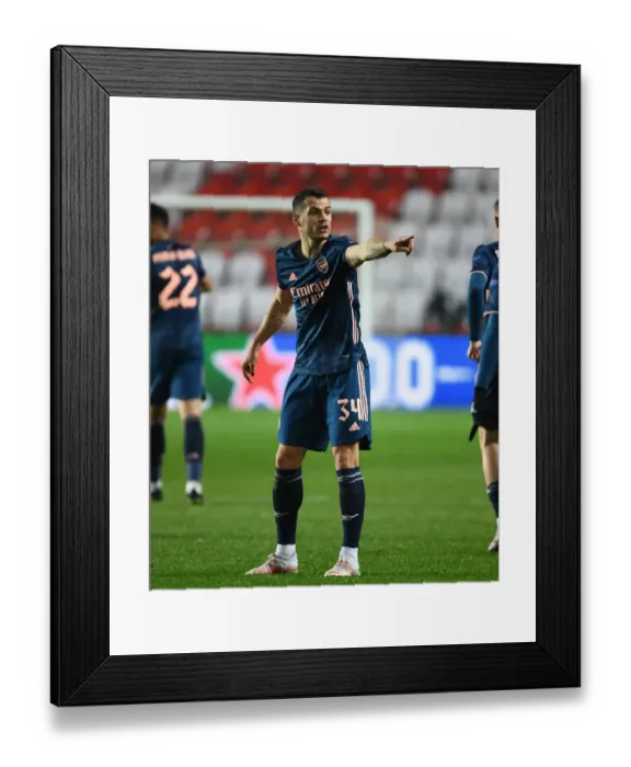 Framed Print : Lone Warrior Xhaka: Arsenal's UEFA Europa League Battle in Empty Eden Arena Framed Print : Lone Warrior Xhaka: Arsenal's UEFA Europa League Battle in Empty Eden Arena