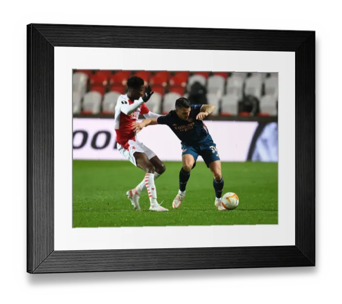 Framed Print : Xhaka vs. Olayinka Showdown: Empty Europa League Arena, Prague - Arsenal's Battle Against Slavia Framed Print : Xhaka vs. Olayinka Showdown: Empty Europa League Arena, Prague - Arsenal's Battle Against Slavia