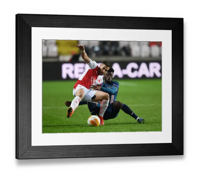 Framed Print : Thomas Partey vs. Ondrej Lingr: A Europa League Showdown at Empty Eden Arena - Arsenal vs. Slavia Prague Framed Print : Thomas Partey vs. Ondrej Lingr: A Europa League Showdown at Empty Eden Arena - Arsenal vs. Slavia Prague