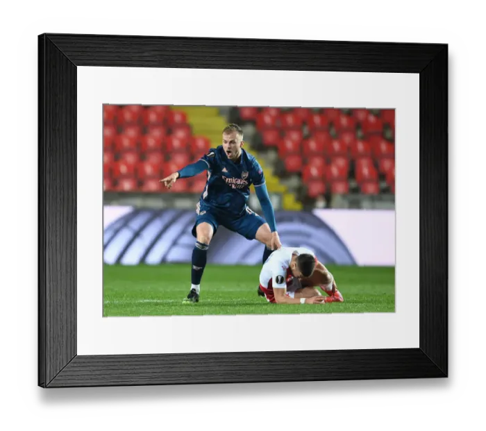 Framed Print : Arsenal's Rob Holding in Empty Eden Arena: Arsenal vs Slavia Praha, UEFA Europa League Quarterfinal, Prague, 2021 Framed Print : Arsenal's Rob Holding in Empty Eden Arena: Arsenal vs Slavia Praha, UEFA Europa League Quarterfinal, Prague, 2021