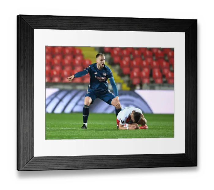 Framed Print : Arsenal's Rob Holding in Empty Eden Arena: Arsenal vs. Slavia Praha, UEFA Europa League Quarterfinal (April 2021)