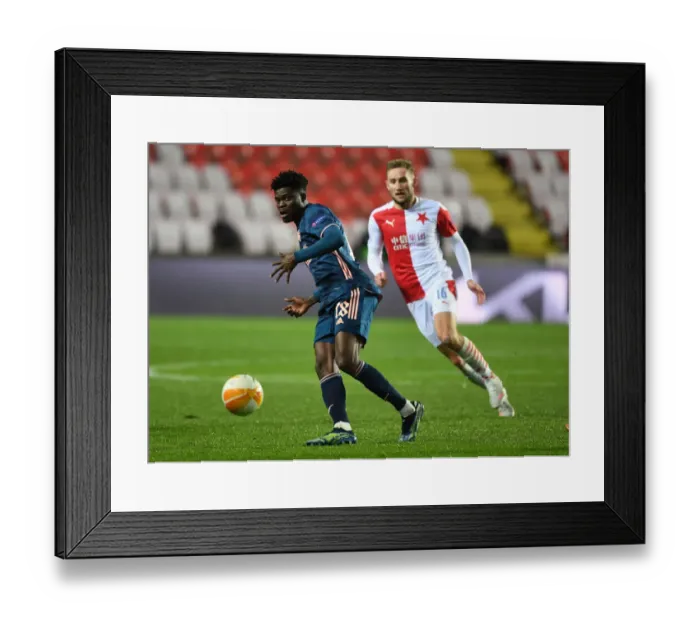 Framed Print : Thomas Partey in Action: Arsenal's Europa League Quarterfinal at Slavia Praha in Prague (Behind Closed Doors)