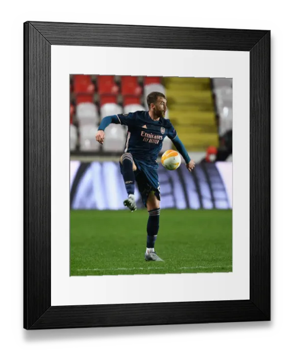 Framed Print : Arsenal's Calum Chambers in UEFA Europa League Quarterfinal Match against Slavia Praha in Prague (Behind Closed Doors)