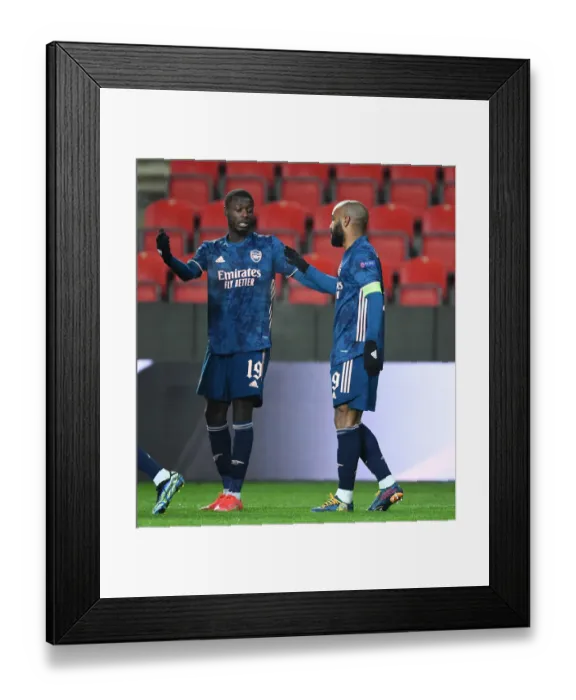 Framed Print : Alexis Lacazette and Nicolas Pepe's Empty Net Celebrations: Arsenal's Europa League Quarterfinal Victory Over Slavia Prague (April 2021) Framed Print : Alexis Lacazette and Nicolas Pepe's Empty Net Celebrations: Arsenal's Europa League Quarterfinal Victory Over Slavia Prague (April 2021)