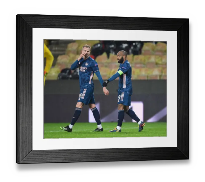 Framed Print : Arsenal's Europa League Triumph: Alexis Lacazette and Rob Holding's Empty Net Celebrations (April 2021)