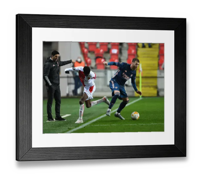 Framed Print : Arsenal's Calum Chambers Faces Off Against Slavia Praha's Peter Olayinka in UEFA Europa League Quarterfinal Framed Print : Arsenal's Calum Chambers Faces Off Against Slavia Praha's Peter Olayinka in UEFA Europa League Quarterfinal