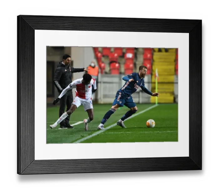 Framed Print : Calum Chambers vs. Peter Olayinka: A Battle in the Empty Eden Arena - UEFA Europa League Quarterfinal Framed Print : Calum Chambers vs. Peter Olayinka: A Battle in the Empty Eden Arena - UEFA Europa League Quarterfinal