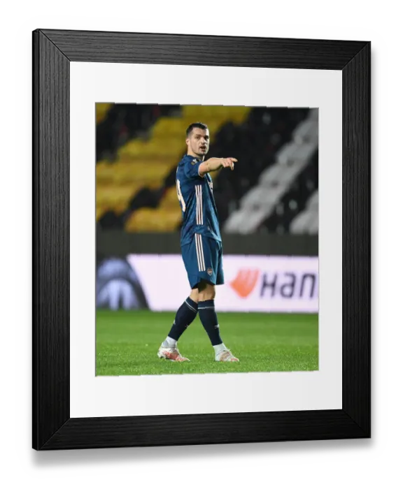 Framed Print : Lone Warrior Xhaka: Arsenal's UEFA Europa League Battle in Empty Eden Arena Framed Print : Lone Warrior Xhaka: Arsenal's UEFA Europa League Battle in Empty Eden Arena