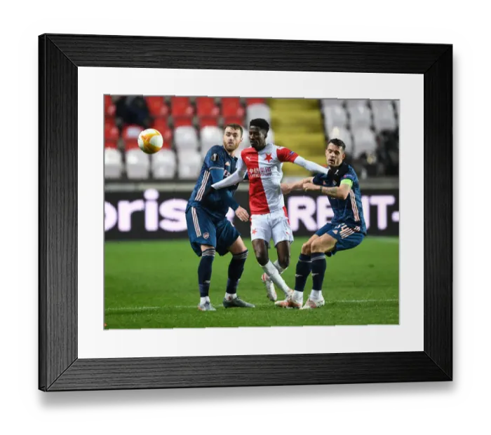 Framed Print : Arsenal vs Slavia Praha: Europa League Quarterfinal Clash in Prague Amidst Empty Stands