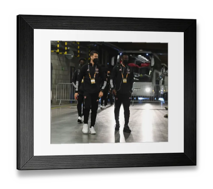 Framed Print : Arsenal FC's Martinelli and Balogun Arrive at Empty Eden Arena for Slavia Praha Showdown - UEFA Europa League Quarterfinals