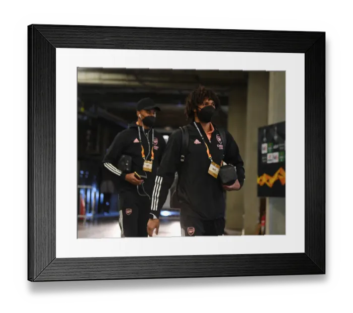 Framed Print : Arsenal's Elneny Arrives at Empty Eden Arena for Slavia Praha Showdown - UEFA Europa League Quarterfinals, Prague