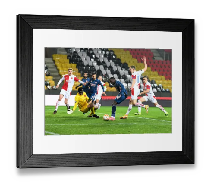 Framed Print : Pepe Scores in Empty Eden Arena: Arsenal's Europa League Triumph Over Slavia Praha (2021)