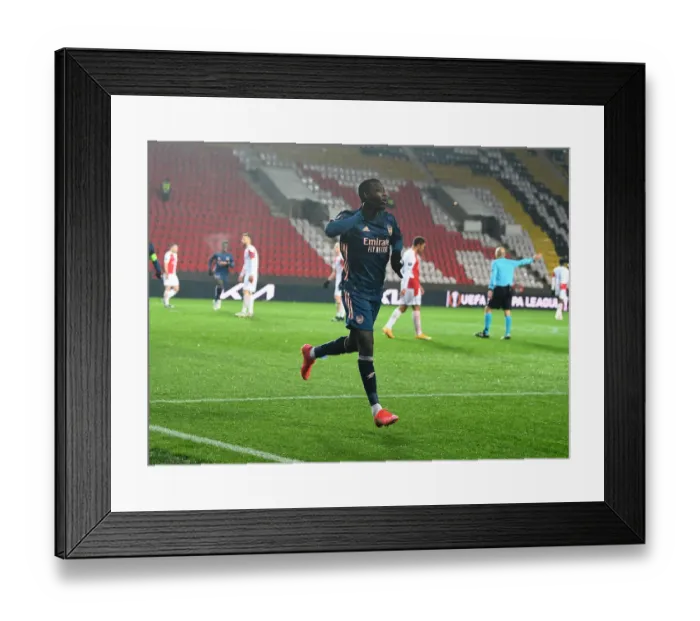 Framed Print : Arsenal's Nicolas Pepe Scores in Europa League Quarterfinal Against Slavia Praha in Prague
